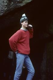 Jason Juray poses for the camera outside the Lustleigh Cleave cave