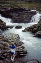 Shane skims stones at Fossegaldsbrui, a small waterfall on the glacial river that we are following up the mountain [Remastered scan, 19/9/2019]