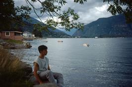 Mark Burnard contemplates the tranqulity of the Sognefjord at Balestrand. This view looks over Dragsvik and along the branch of the fjord that leads to Fjaerland [Remastered scan, August 2019]