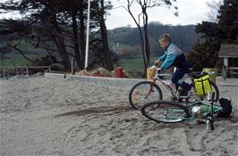 Phillip Harler attempts to ride through the sand at Blackpool Sands, just about the only part of the area that was not destroyed by the recent storms. [New scan, July 2019.  Kodachrome 64 film]