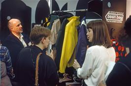 Vicky Sanders checks out some cycle clothing on display at Cyclex [New scan, July 2019.  Kodachrome 64 film]