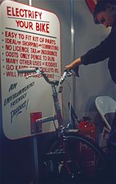 One of our members, possibly Shane Powell, tries an electric bike at Cyclex [New scan, July 2019.  Kodachrome 64 film]