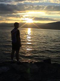 Gavin at sunset on the shores of Lake Neuchâtel in the Cudrefin Nature Reserve