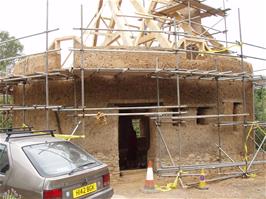 Construction of a 'mud hut' in Dartington village