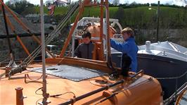 Ash and Olly on the lifeboat at the Shipwreck Heritage Centre, Charlestown