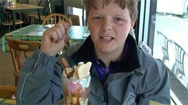 Ash enjoys his Knickerbocker Glory at the Tasty Corner Cafe, West Looe