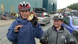 Zac showing off the large shell he found on the Camel Trail just after arrival at South Quay, Padstow, 11.7 miles into the ride