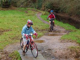 Olly and Sam riding the tracks at the end of Longmarsh, Totnes