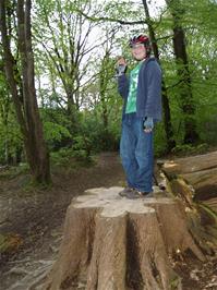 Zac poses for a low-light photo in Whiddon Scrubs wood, halfway down the track - new photo for 2024