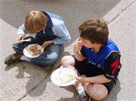 Olly and Ash enjoy hot pancakes back at the car park