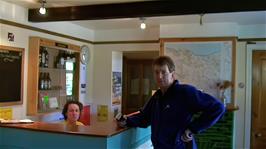 Michael at the Minehead Youth Hostel reception, caught by Ash while doing his video tour of the hostel