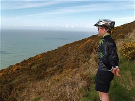 Ash admires the spectacular views on the coast path to Woody Bay