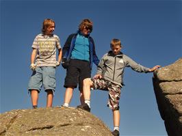 Jack, Ash and Callum climbing rocks at Bonehill