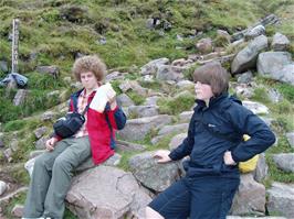 Ryan and Ash take a break during the climb of Ben Nevis just below the lake