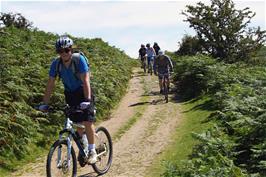 Ash leads the group on the track from Bonehill to Natsworthy