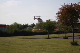 A private helicopter lands in Tiverton