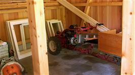 An unusual mini-tractor in a barn at Sengg, 9.9 miles into the ride