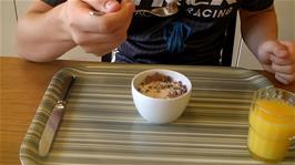 Ash starts his breakfast cereal at Lucerne Youth Hostel, which he describes as a mixture of Krave, chocolate bits and Jordan's Country Crisp - but just an OK rating for taste