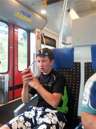 Will on the train from Brunnen to Lucerne after completing 33.4 miles of cycling