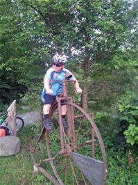 John tries the Penny Farthing at the Sculpture Park on the banks of the River Reuss, right beside Route 9