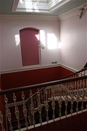 The main staircase in Golant Youth Hostel