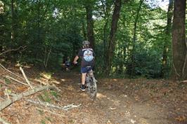 George and Dillan riding the track through Birchetts Wood