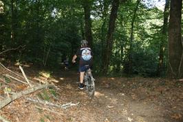 George and Dillan riding the track through Birchetts Wood