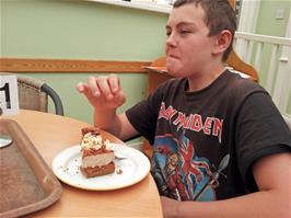 Dillan relishes his chocolate flake cheesecake at Fermoy's Garden Centre - new photo for 2024