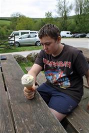 Dillan enjoys his delicious toffee ice cream with clotted cream