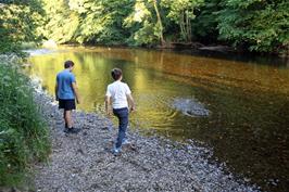 Skimming stones on the River Dart