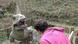 Lawrence gets to know a small but ferocious-looking dinosaur in Dinosaur Grove, Wookey Hole