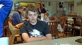 Dillan feels that George's immature behaviour is down to the fact that he is "prepubescent", in the Reading Room Cafe, Clapham