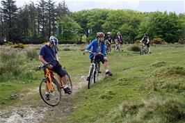 Dillan and George with the rest of the group on the moor, with Lud Gate behind