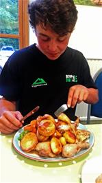 Lawrence starts his enormous home-baked roast at Osmotherley Youth Hostel
