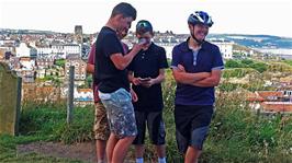 Lawrence, Dillan, George and Will have phone fun after the group photos in the grounds of St Mary's Church, Whitby