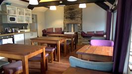 The small but cosy kitchen and common room at Tintagel Youth Hostel