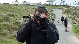 Dillan photographing Michael near the First and Last House, Land's End