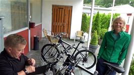 John chats with an Australian cyclist outside Bergen Montana youth hostel