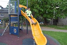 Jude tries out the new slide at Broadhempston Play Park