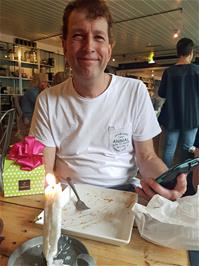 Michael gets an unexpected birthday gift at the Café and Chocolaterie, Lillehammer