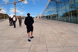 Walking up the roof of the Oslo Opera House, the largest cultural building constructed in Norway since the year 1300