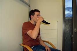 Jude tries his Viking drinking horn with some tea made at Oslo Haraldsheim youth hostel