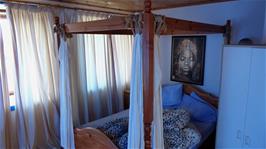Jude's four-poster bed at the Mountain Lodge guest house, Gairloch