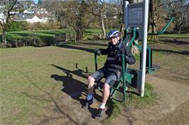 Dillan pushes himself to the limit on one of the outdoor exercise machines in Mill Marsh Park, Bovey Tracey