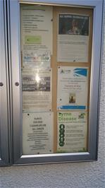The community noticeboard on The Village Hall, Plockton