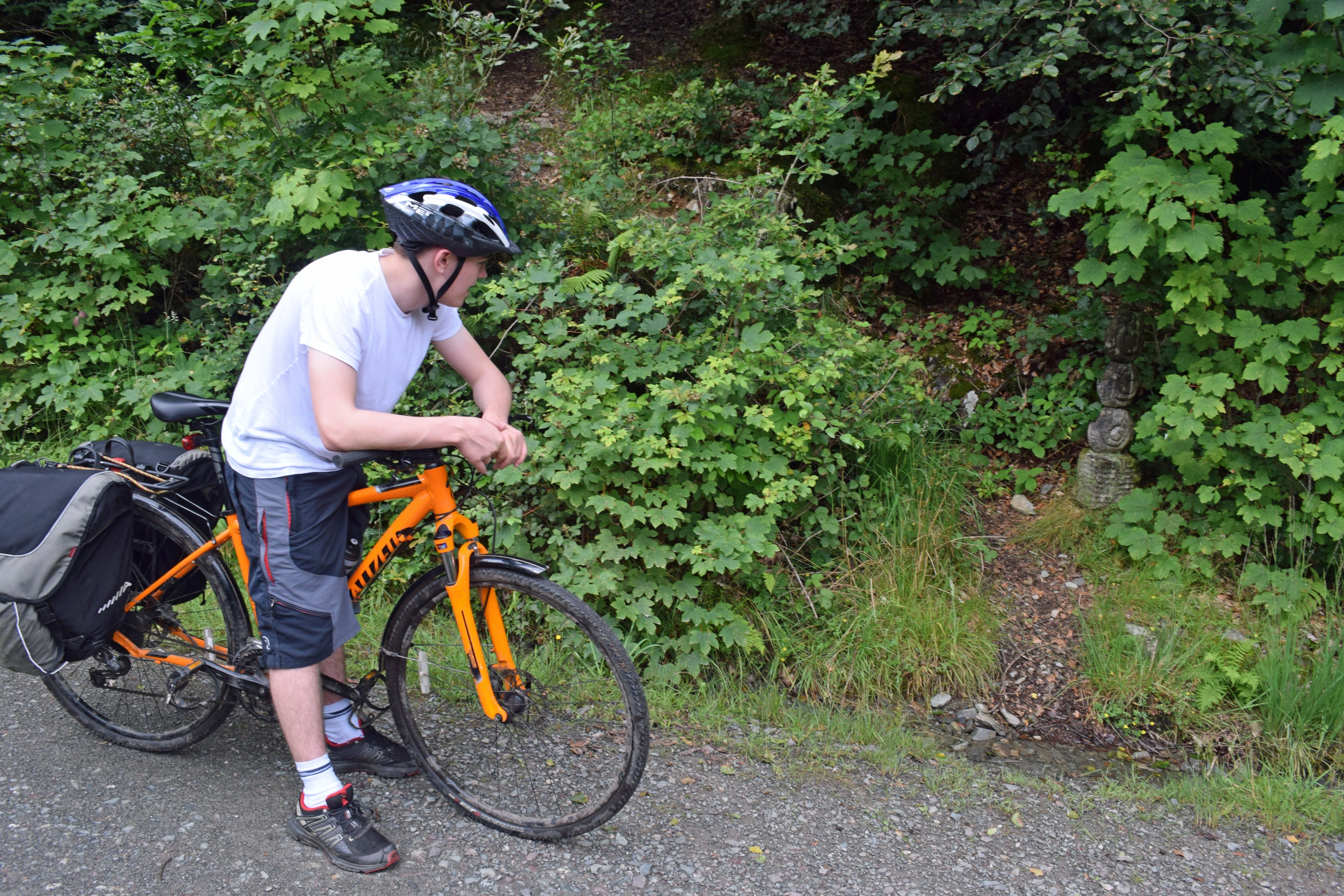 Dillan with what proved a marker for a sculpture in the forest above