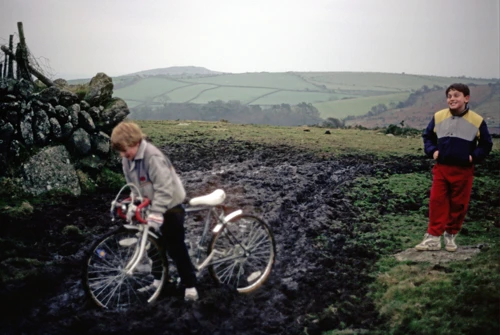 Nathan watches as Chris Bailey (?) tests the Skerraton Down mud.