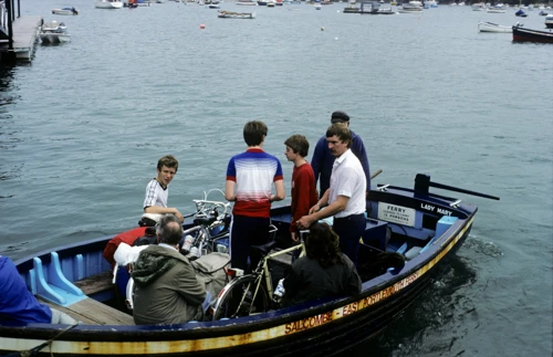 Three members leave Salcombe on the first of four boat journeys to East Portlemouth
