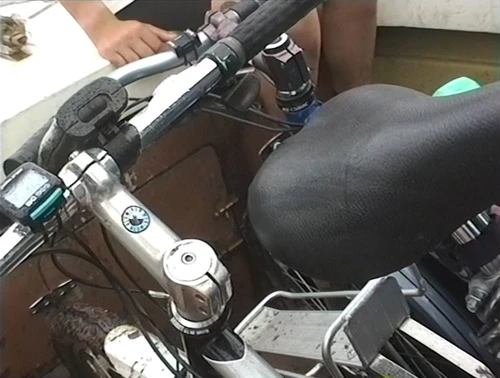 The last bikes loaded onto the private boat at the Alltnaharrie Inn.