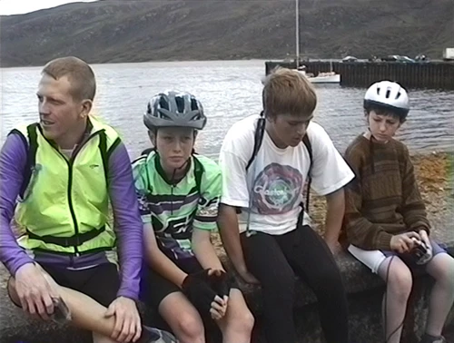 Grateful the overnight rain stopped; perched on the wall opposite Ullapool Youth Hostel.